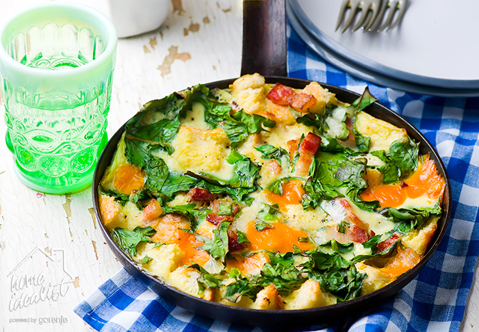 Skillet Strata with Bacon, Cheddar, and Greens